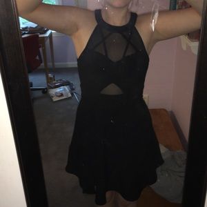 Black dress with mesh cutouts